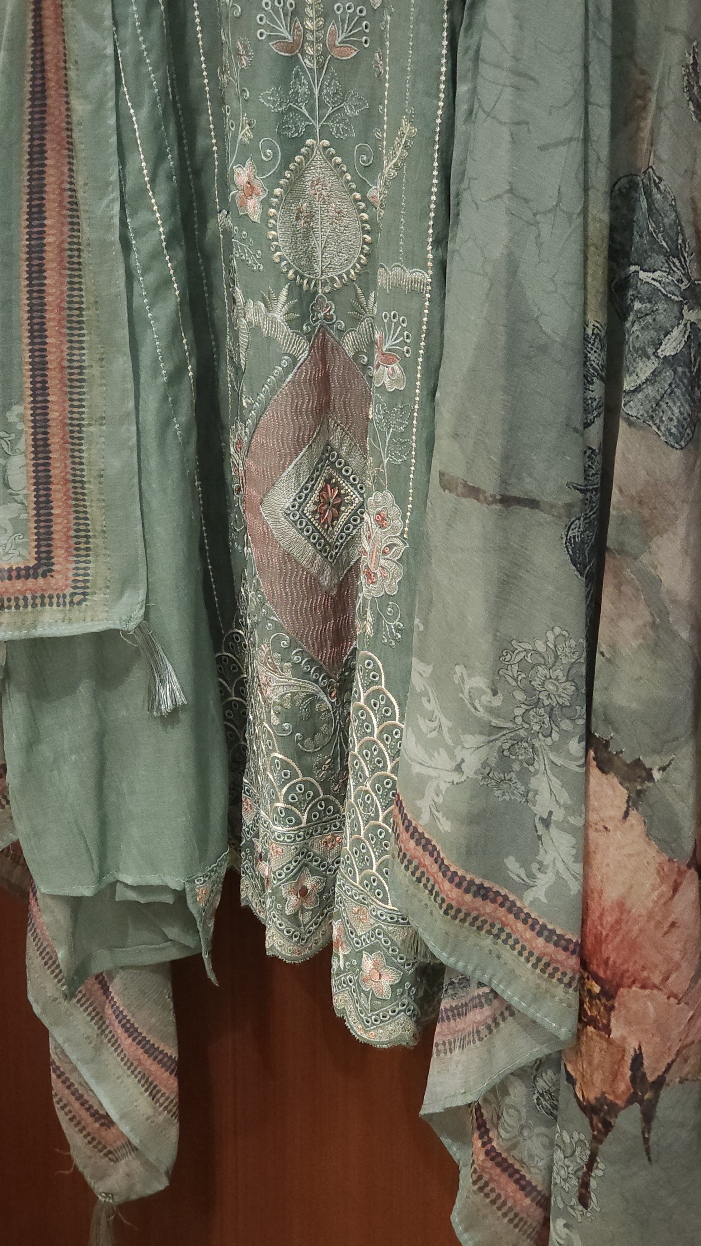 Mul Cotton Suit featuring cutwork & multicolor thread embroidery